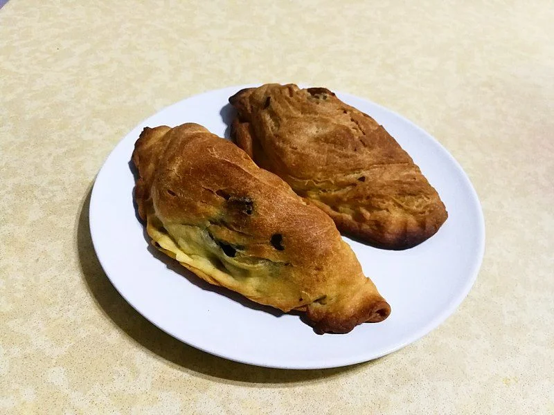 Piruna di Niscemi: Il gusto autentico della Sicilia in un calzone di spinaci Piruna di Niscemi: Il gusto autentico della Sicilia in un calzone di spinaci