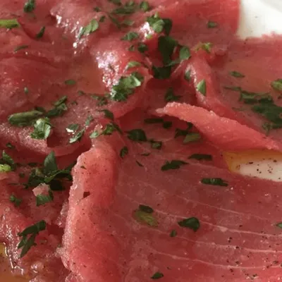 Savor the Mediterranean Elegance: Tuna Carpaccio Delight